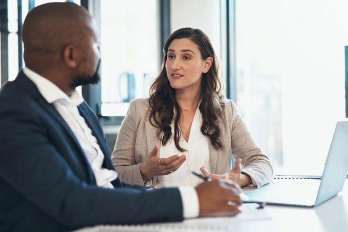 woman asking her boss for a raise