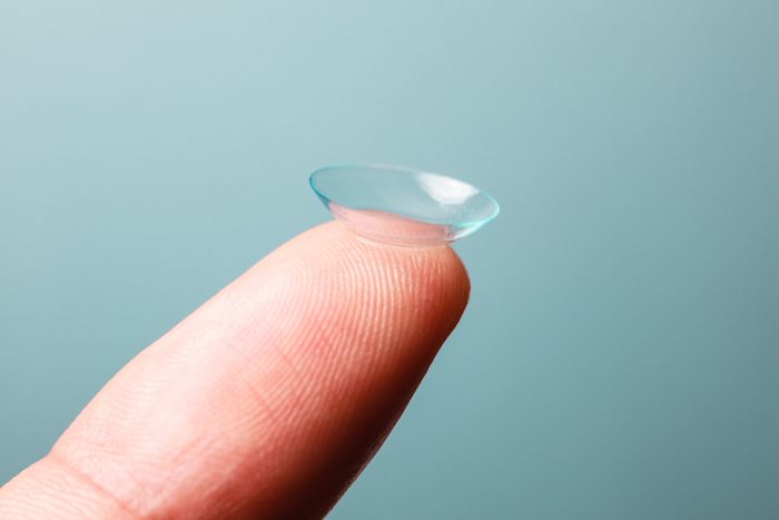 Contact lens balance on the tip of index finger