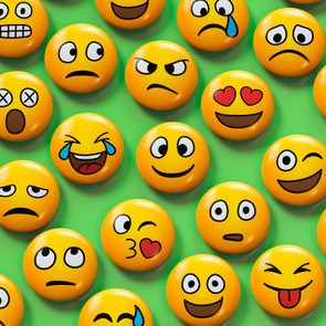 various emojis with different facial expressions on a green background