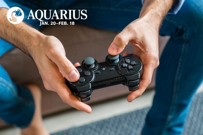 hands with video game controller