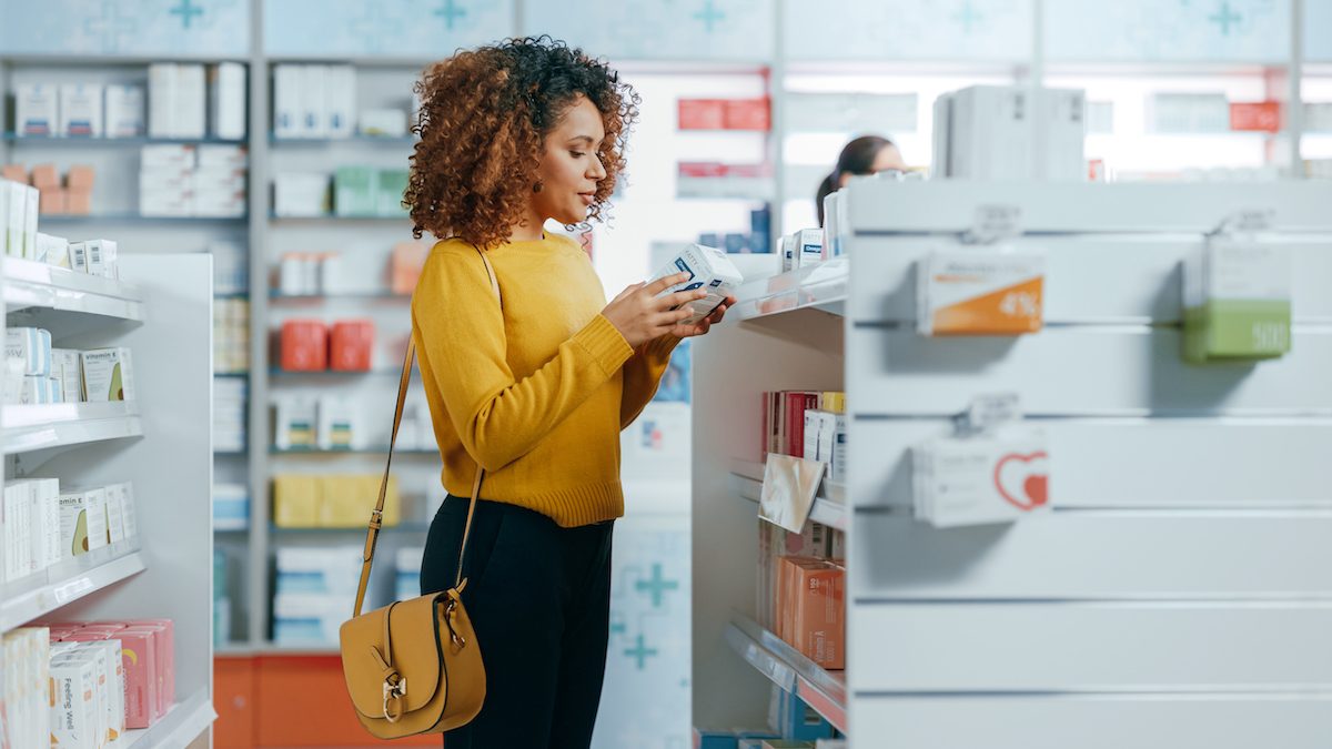 Pharmacy,drugstore:,portrait,of,a,beautiful,black,young,woman,choosing