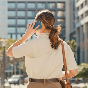 Cropped Shot Of An Unrecognizable Young Businesswoman Making A Phonecall While On Her Morning Commute Into Work