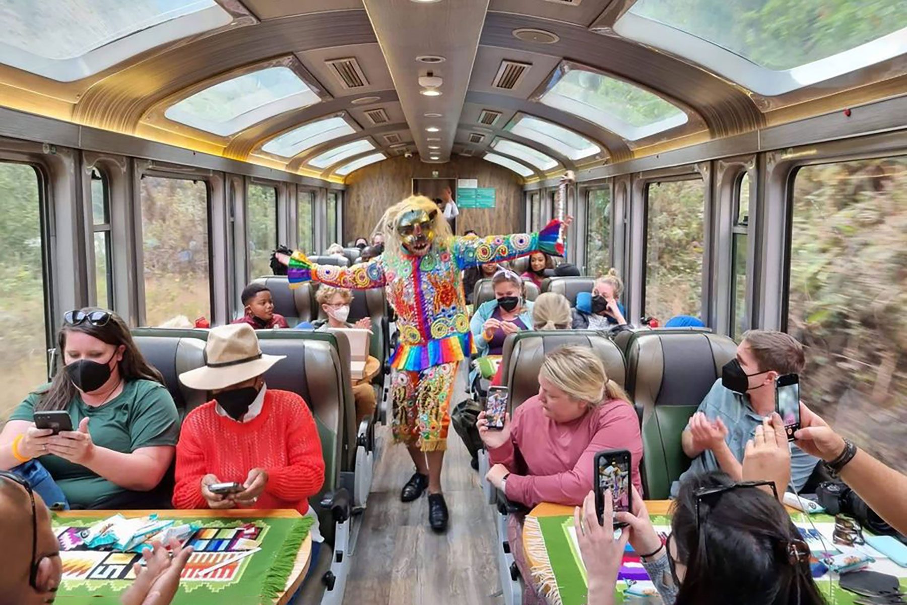 Joker Entertaining People in Train