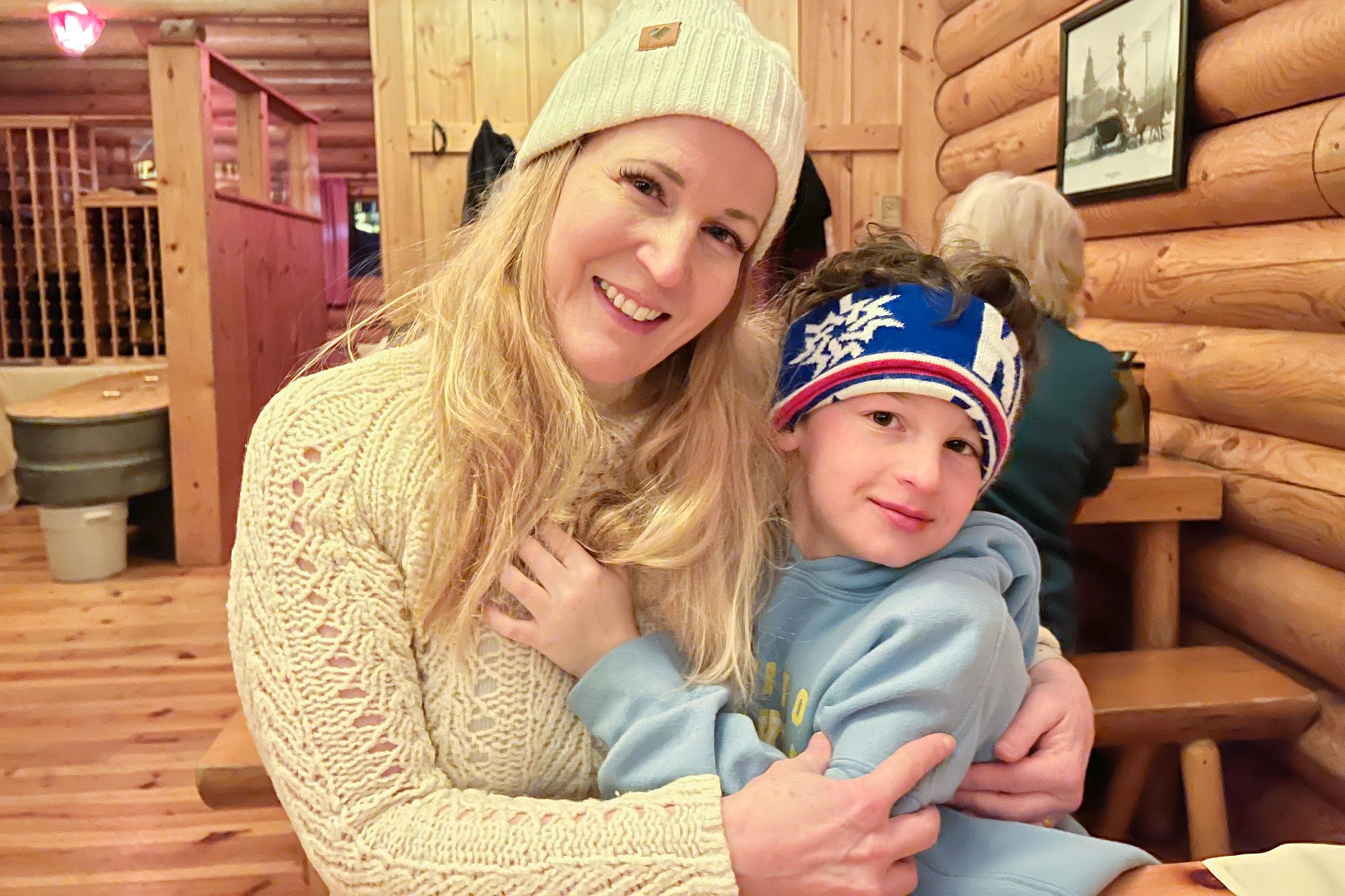 author, Anne Fritz, with her son in a ski lodge in keystone, coloragdo