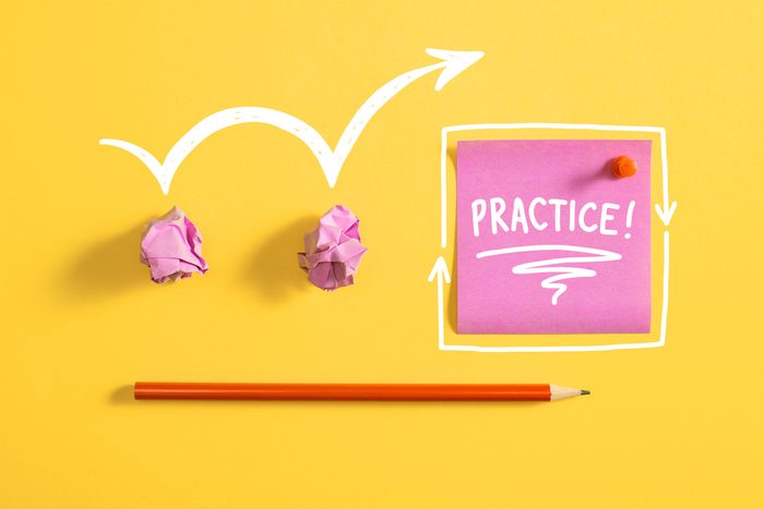 crumpled paper, sticky notes and pencil, arrow doodles