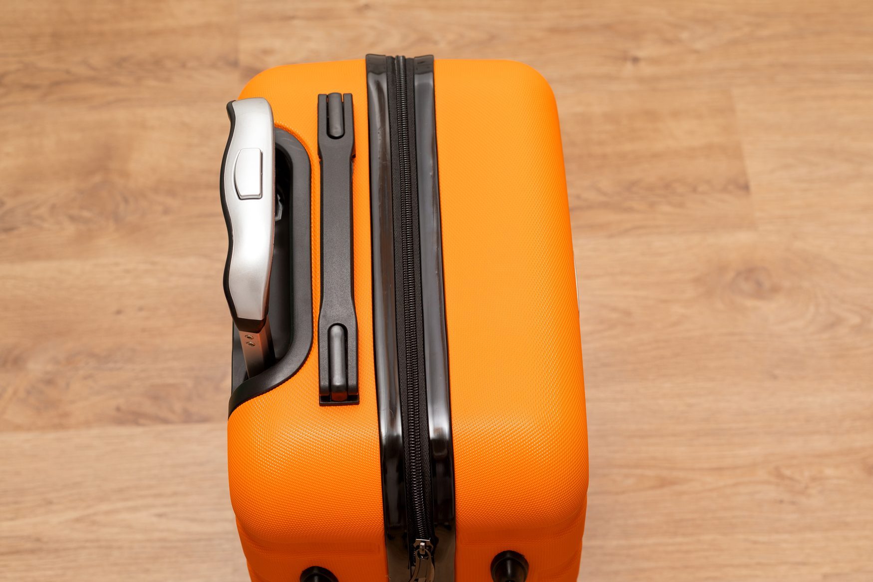 Orange travel suitcase