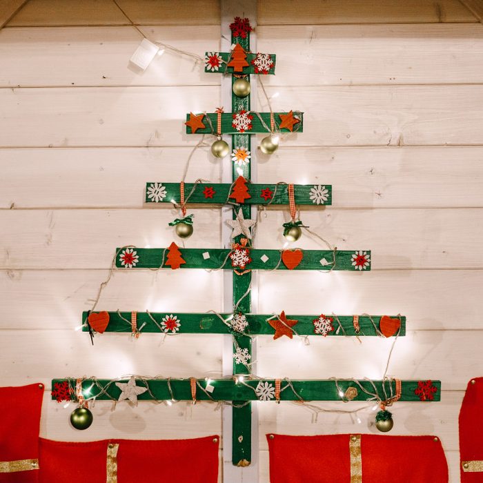 Abstract Christmas tree decorated with stars, hearts and snowflakes.