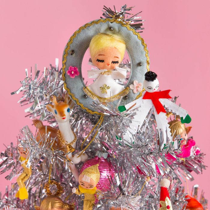 Vintage Christmas Background with Silver Christmas Tree and Angel Tree Topper