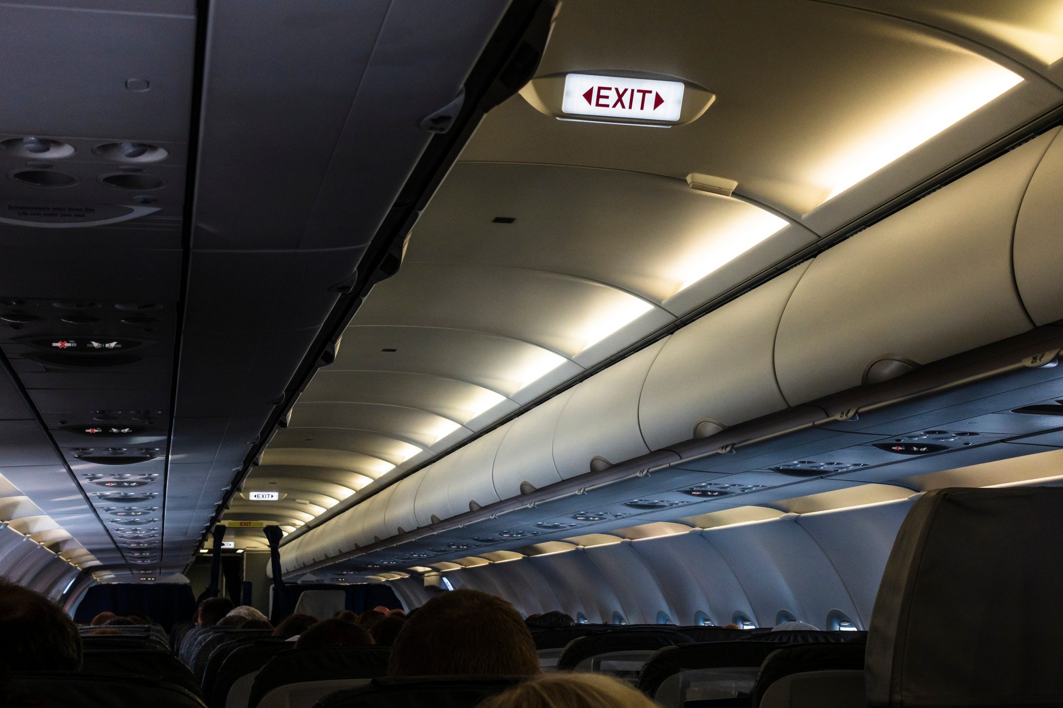 The Surprising Reason Airline Crews Dim the Cabin Lights (It’s Not to Help You Sleep)