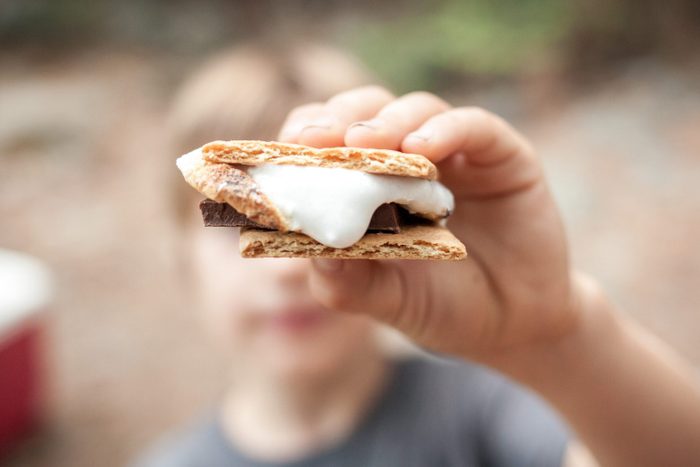 Boy holding a s'more