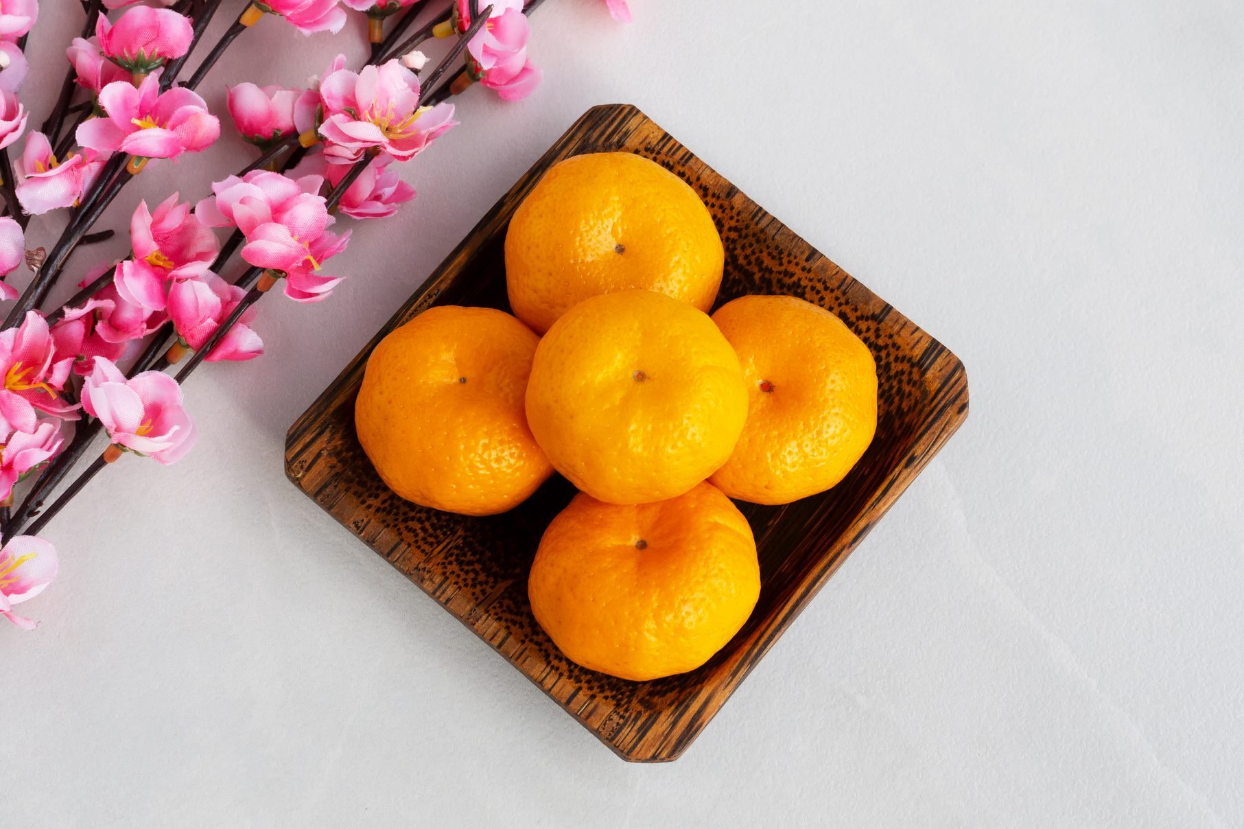 Mandarin Oranges and Sakura Bloom Chinese New Year Background