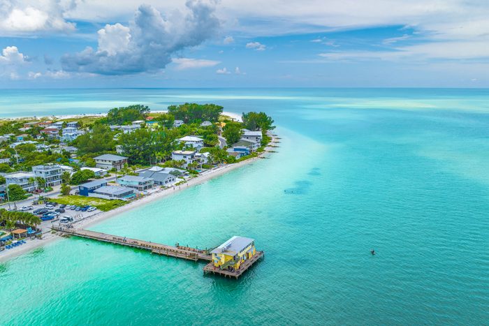 An Aerial View Of A Fishing Pier On Holmes Beach In Anna Maria Island Florida