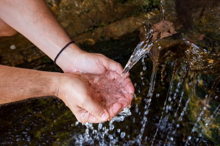 In the hands of water flows from the source