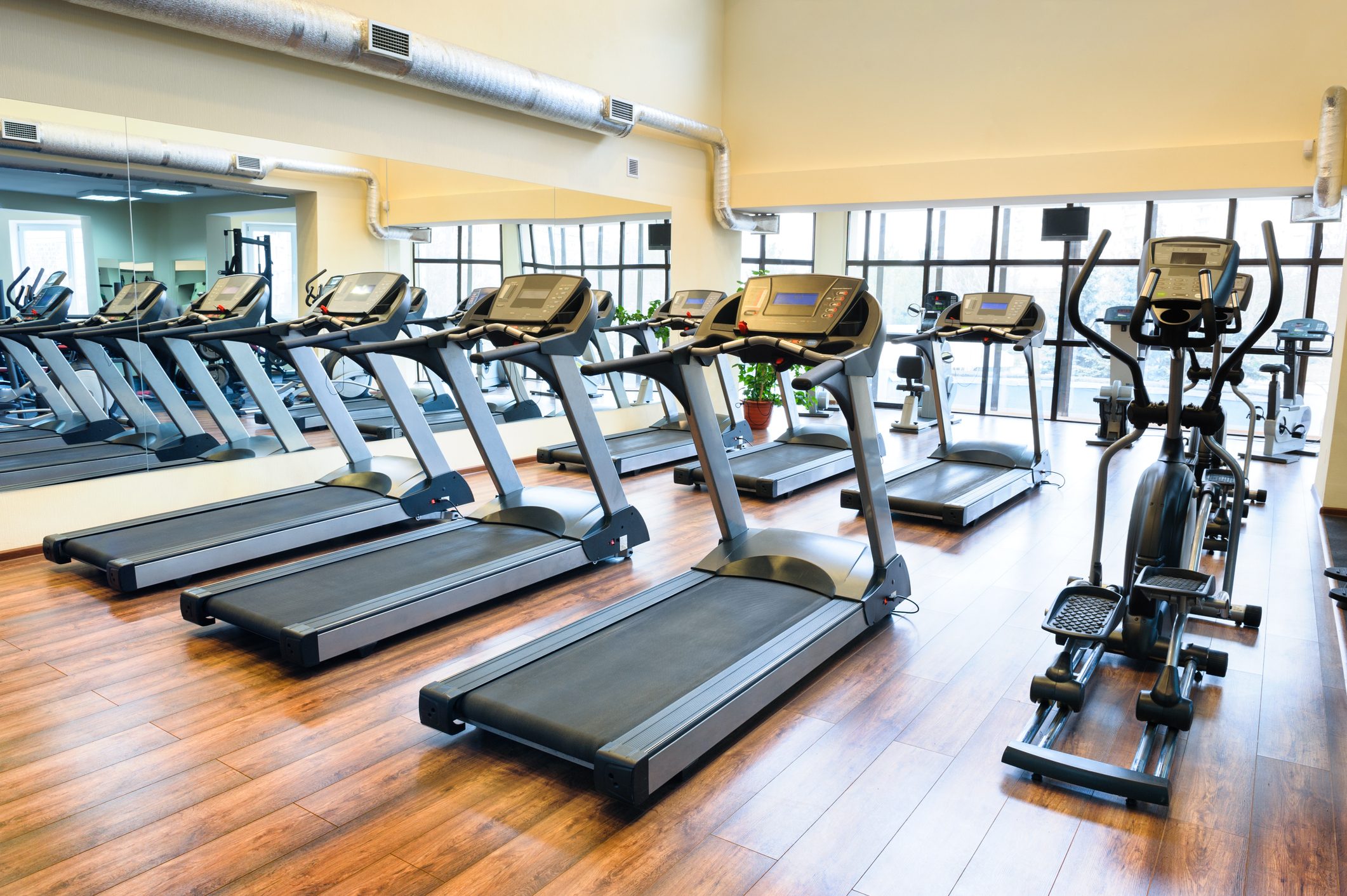 Set of treadmills staying in line in the gym