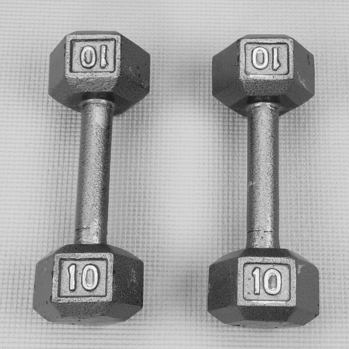 Ten Pound Dumbbells on Exercise Mat