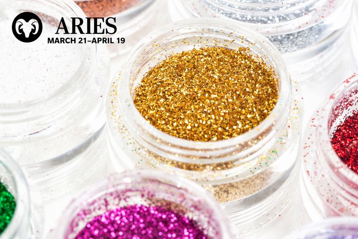 glitter with aries zodiac in upper left corner