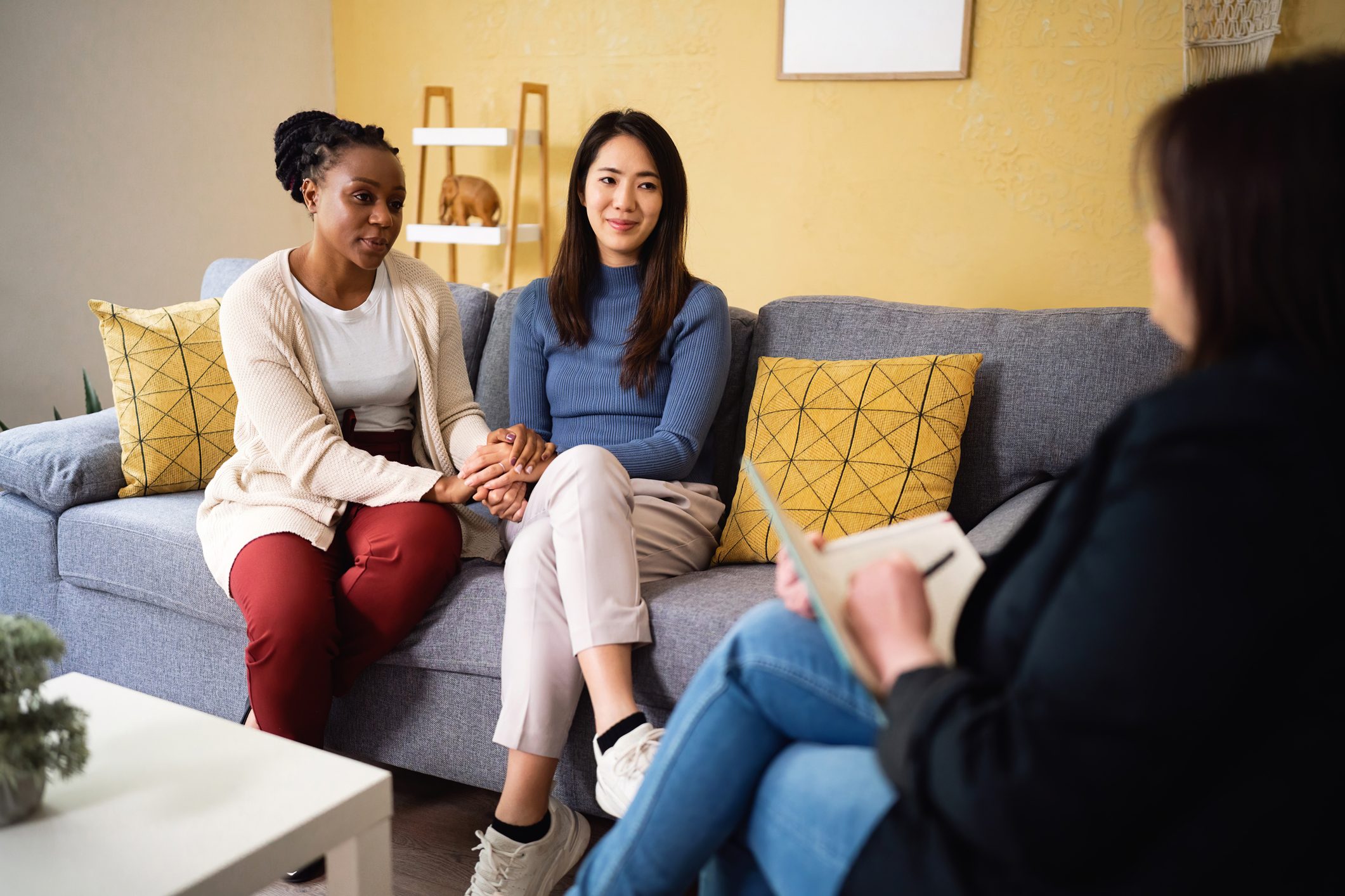 Multiracial lesbian couple, at the couple therapy