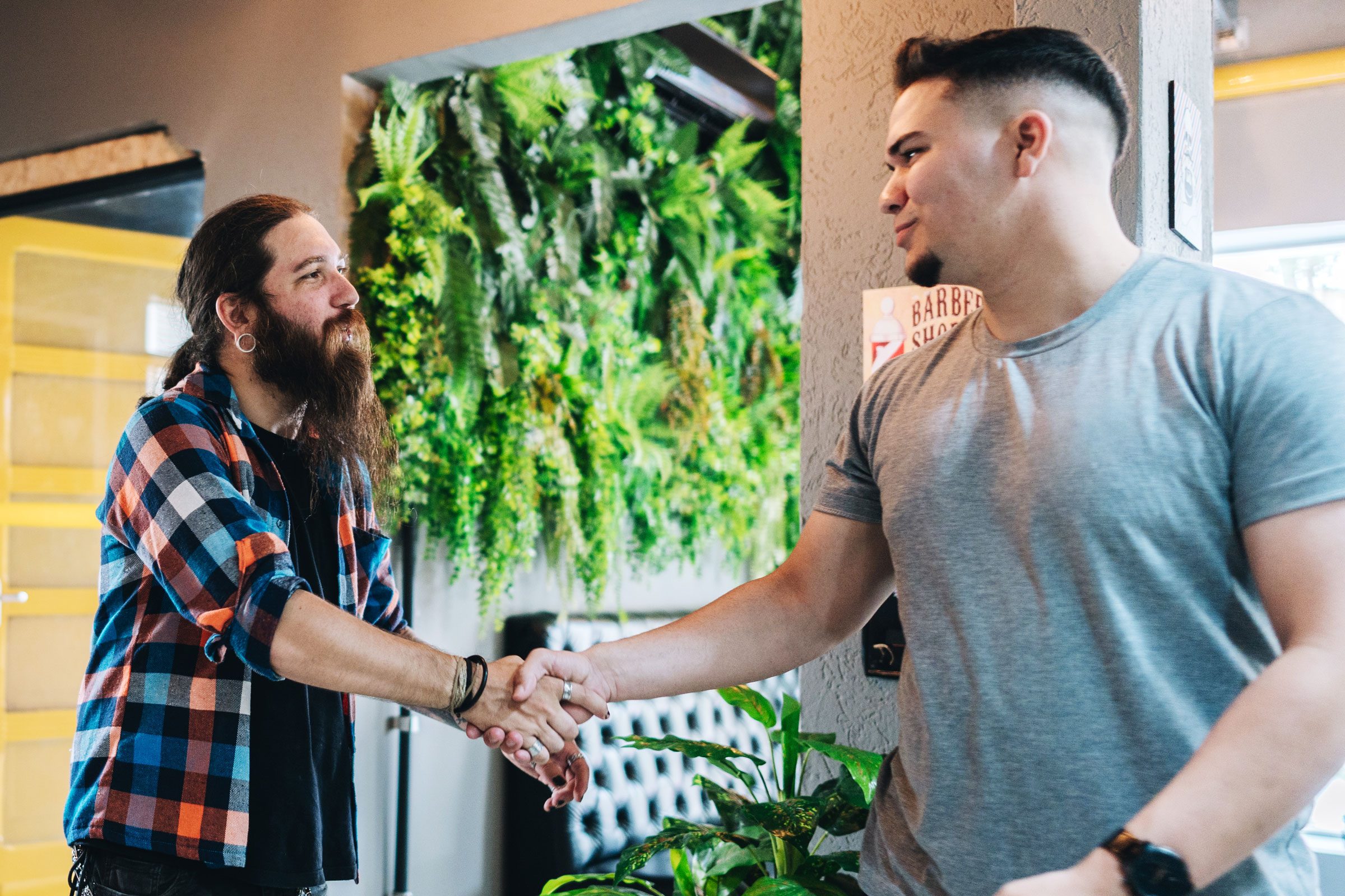 two men saying good bye with a handshake