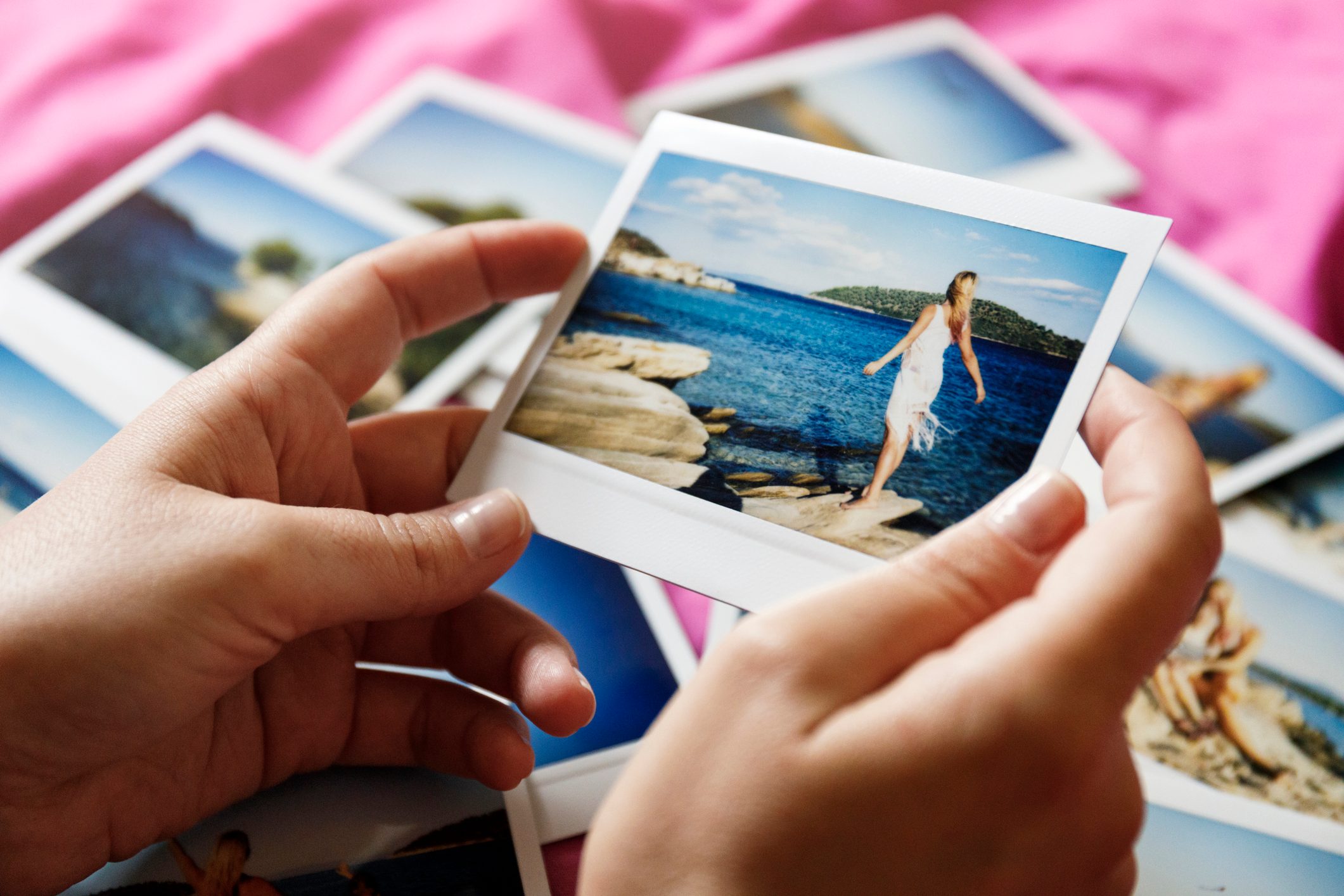 Browsing vacation photographs at home - a closeup