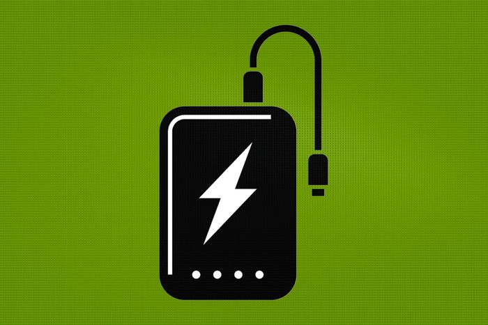 illustration of power bank for charging phone on a green background