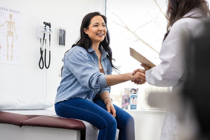 woman shaking the doctor's hand