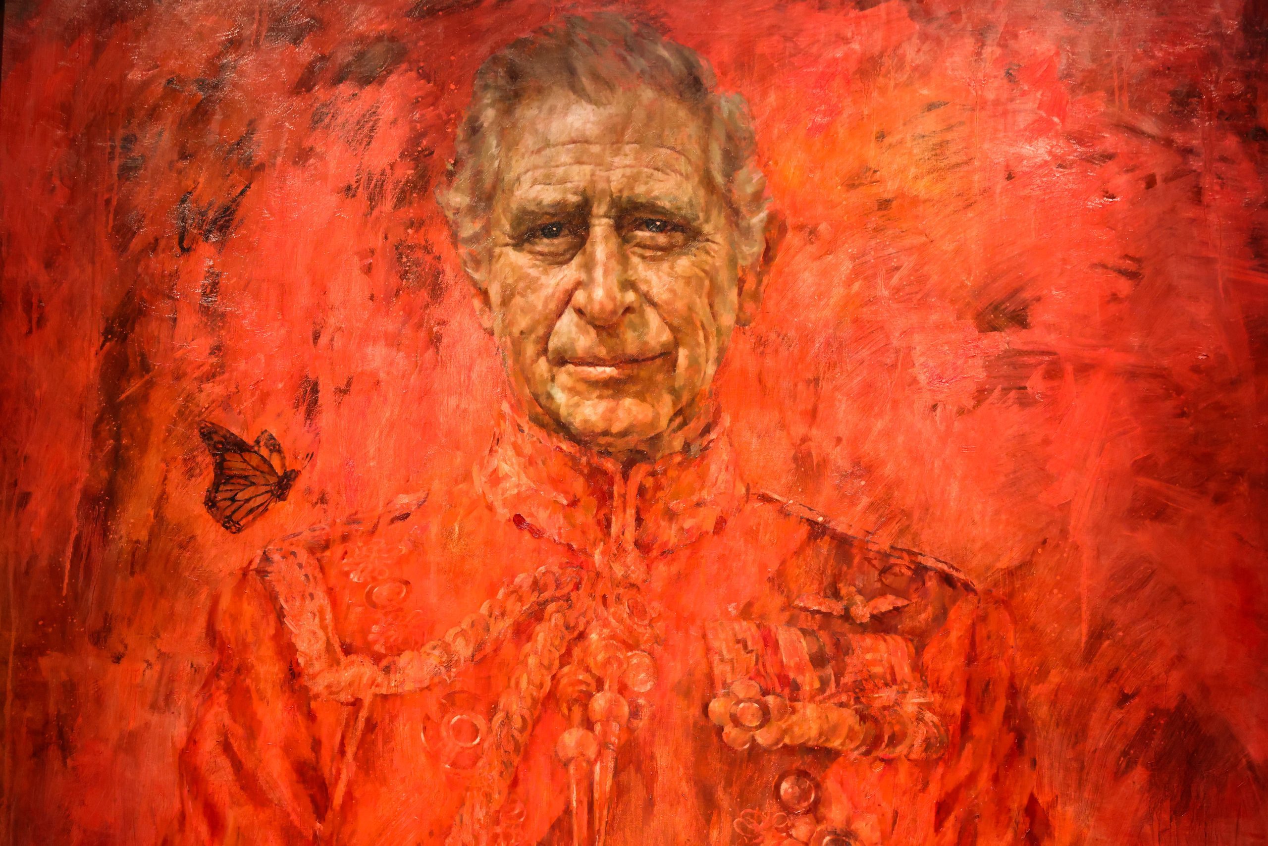 Detail of the King Charles portrait by Jonathan Yeo showing the face and butterfly on his shoulder
