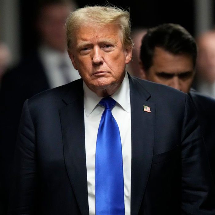 Former U.S. President Donald Trump walks to speak to the media following his hush money trial at Manhattan Criminal Court on May 30, 2024 in New York City.