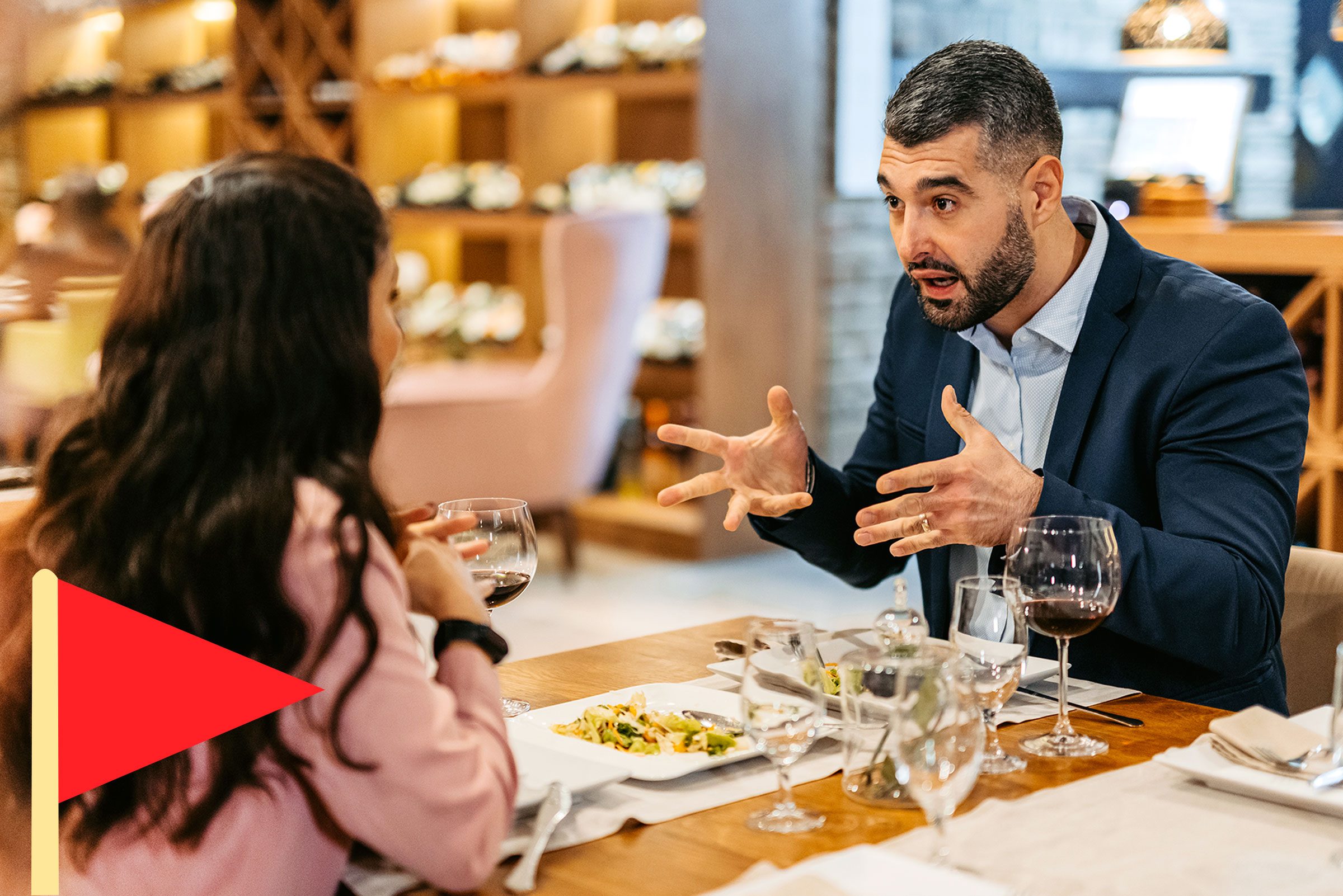 man talking a lot during a dinner date with a red flag icon in he bottom left corner