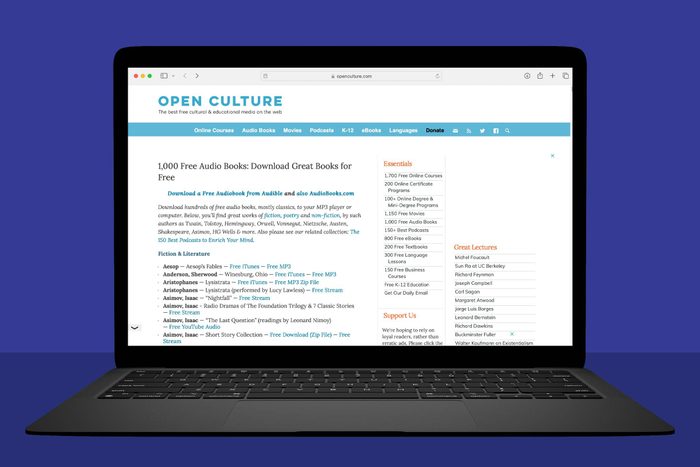 Places To Get Audiobooks For Free Online laptop showing Openculture.com on blue background