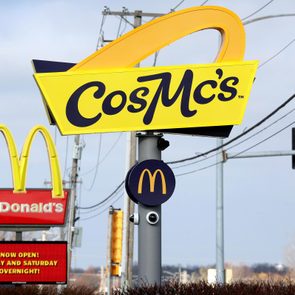 Cosmcs street sign and mcdonalds sign in the background