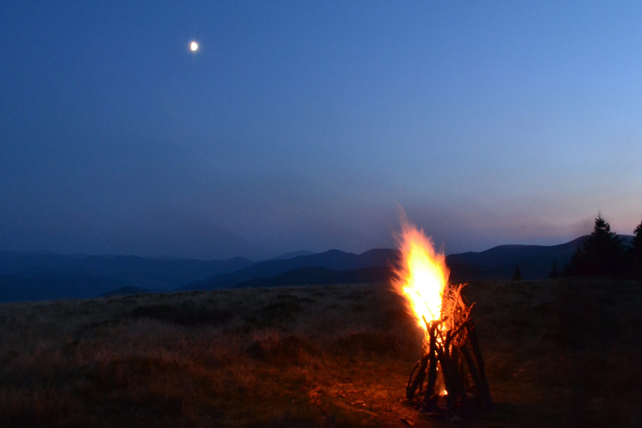 Fire, moon, cloud mountains travel sky