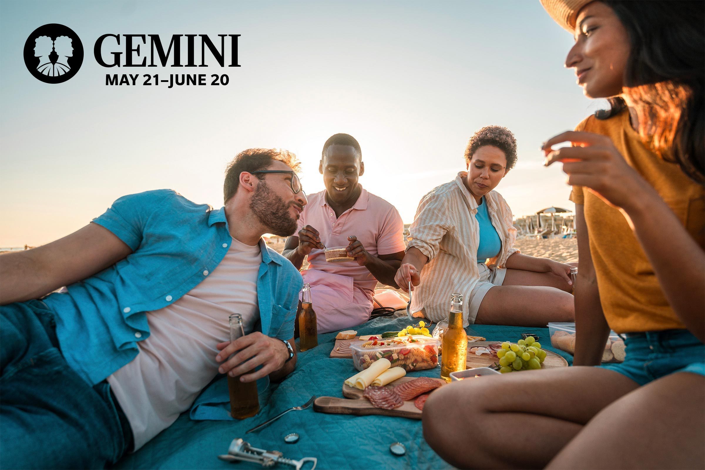 group of friends having a beach picnic