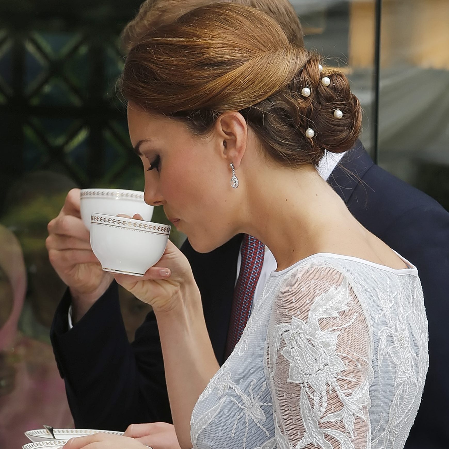 The Duke And Duchess Of Cambridge Drinking Tea