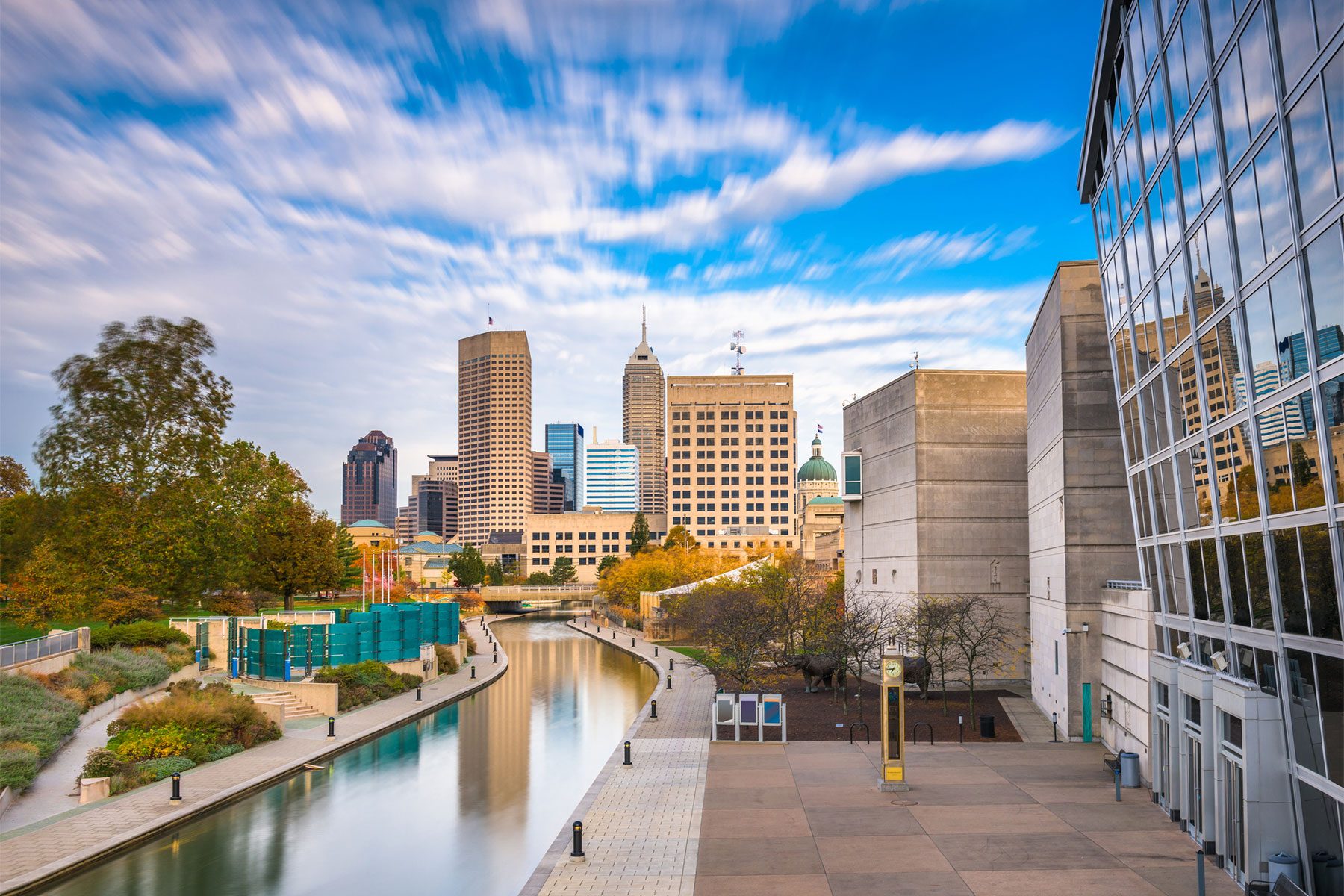 Indianapolis, Indiana, USA downtown skyline over the river walk.