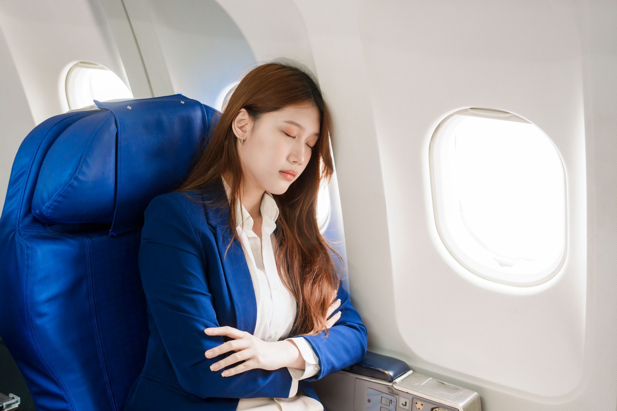 The Surprising Reason You Should Never Rest Your Head Against an Airplane Window