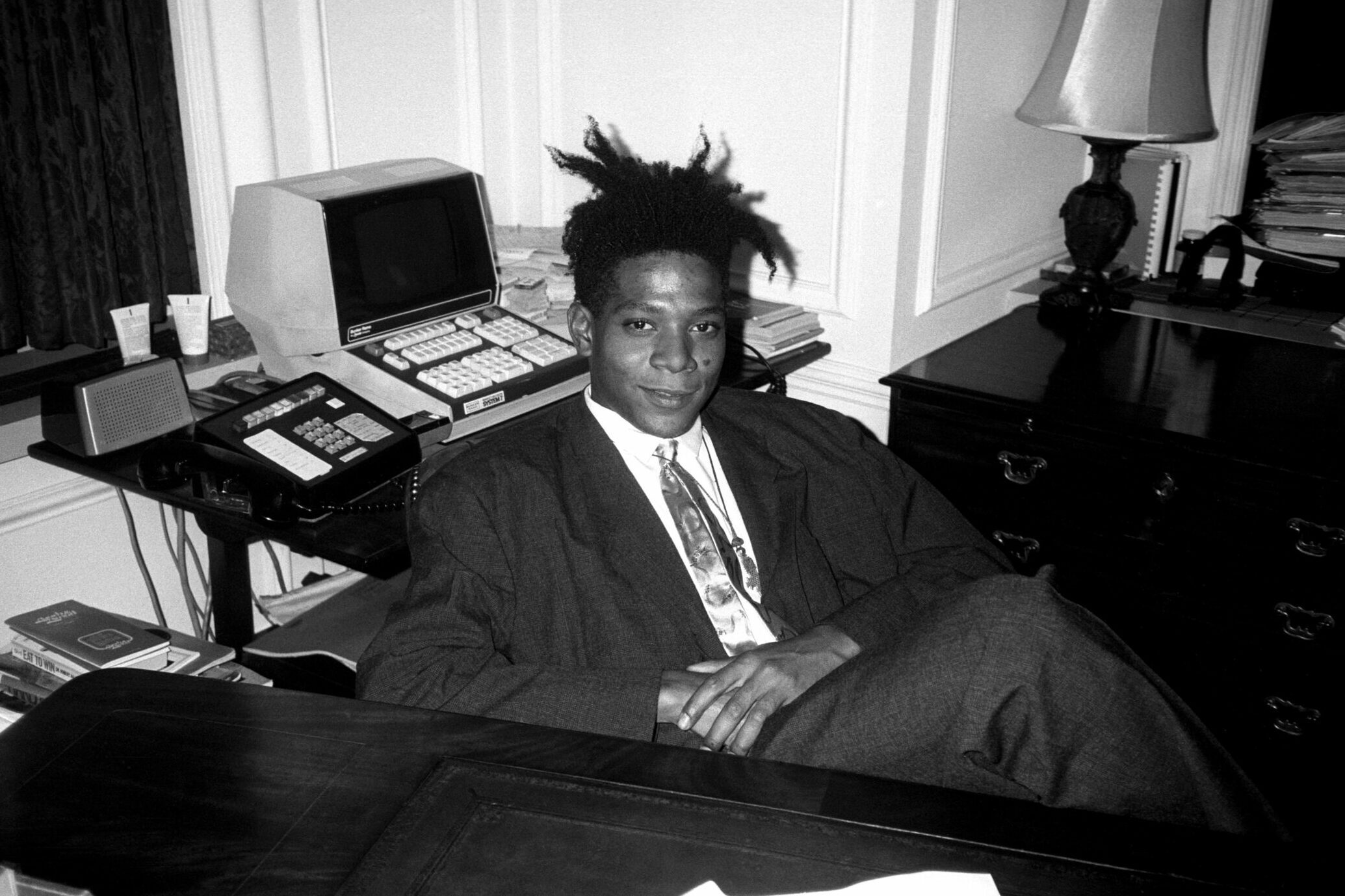 Jean - Michel Basquiat at the surprise birthday party for Susanne Bartsch at the Rainbow Roof, at Steven Greenberg's office, 30 Rockefeller Plaza