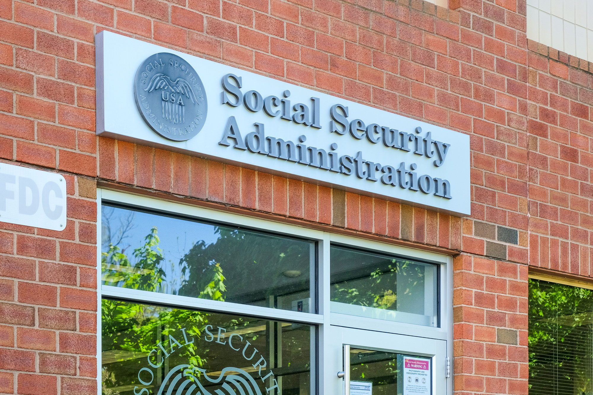 General View Of Social Security Administration Sign On Building Wall