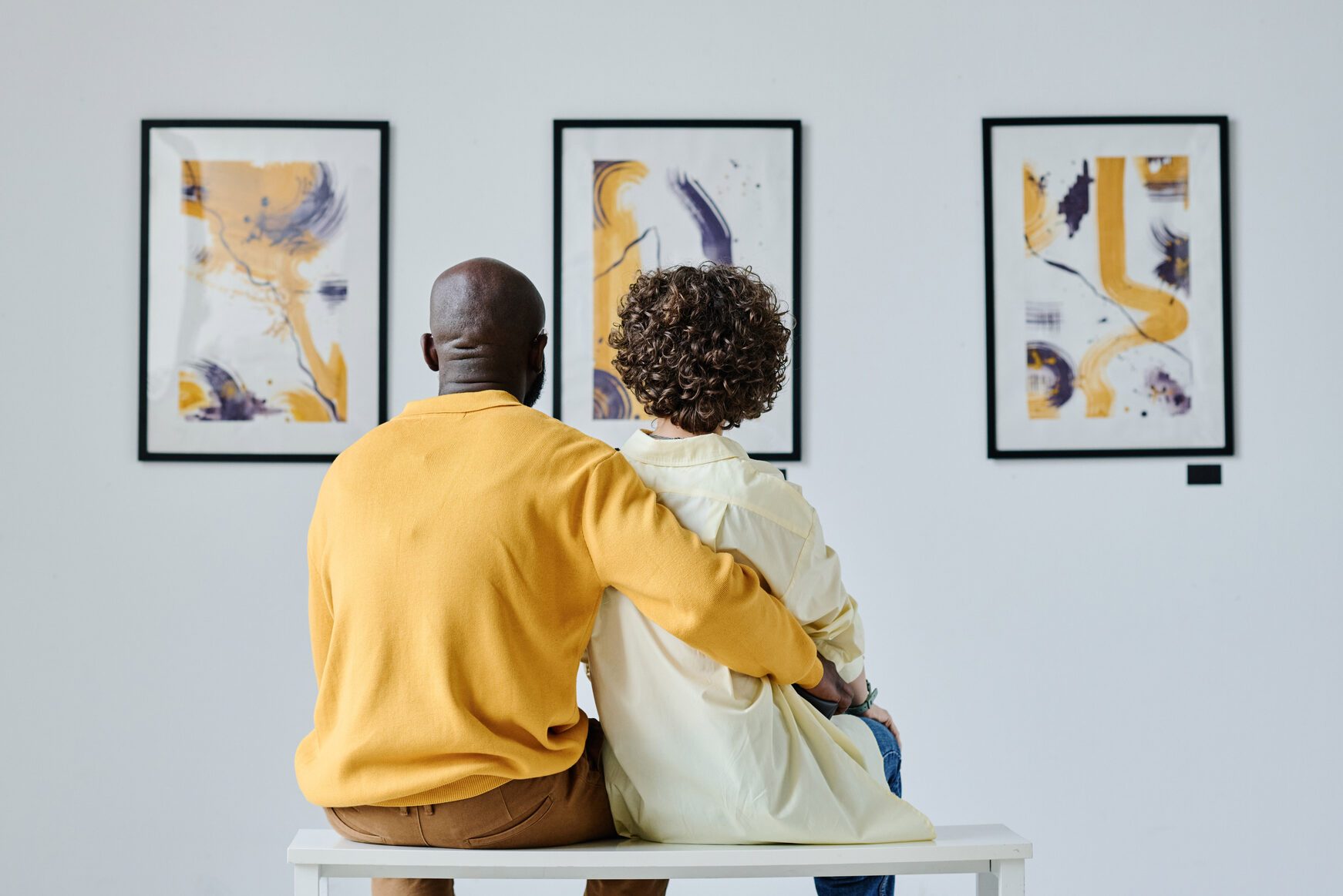 Multiethnic couple enjoying modern art
