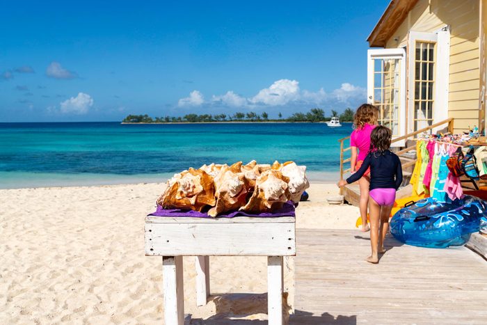 tourist shop in Nassau Bahamas with conch shells by the beach