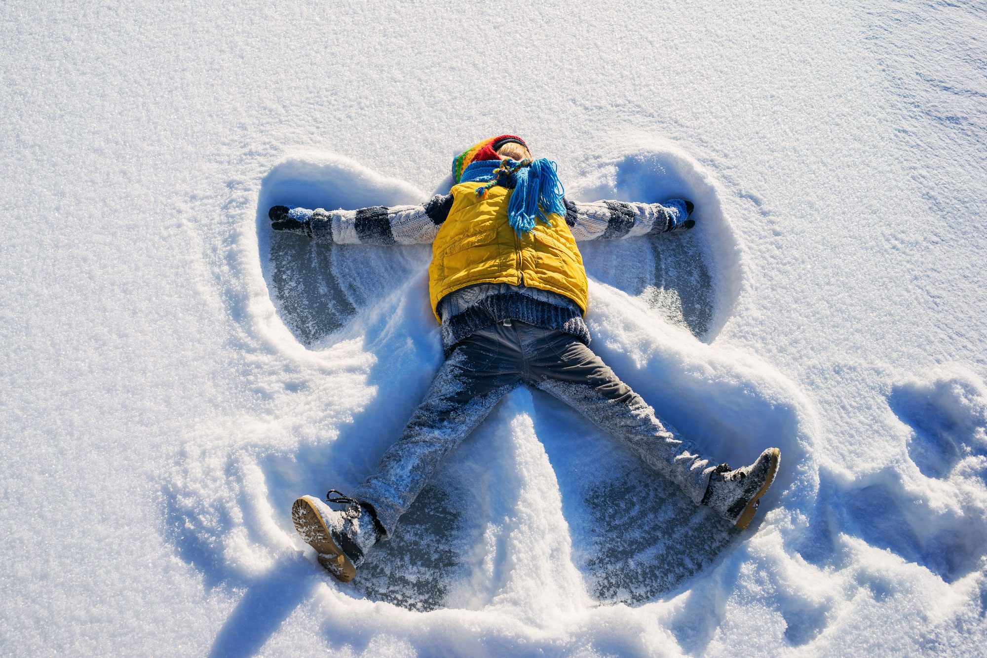 Boy Making A Snow Angel