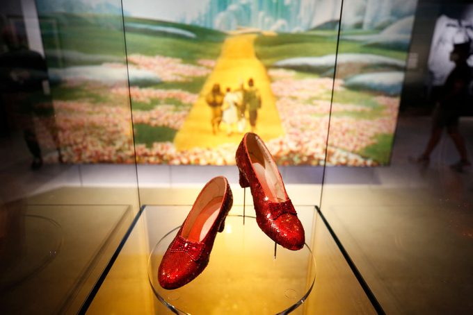 the ruby slippers worn by Judy Garland from the The Wizard of Oz in the Academy Museum in Los Angeles, CA.