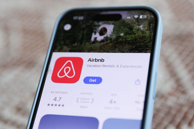 Airbnb on App Store on a phone screen