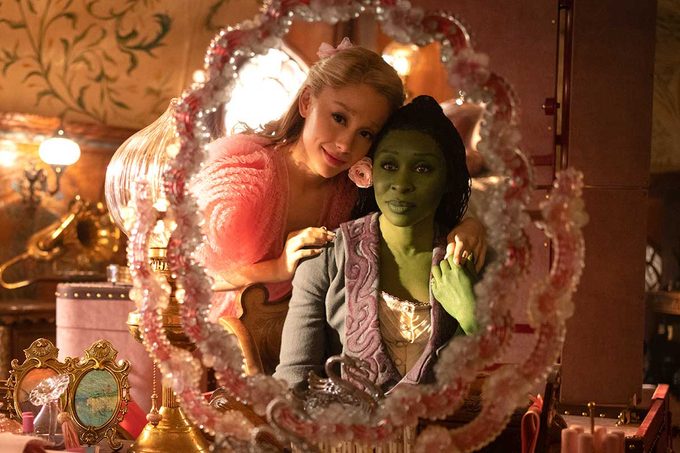 L to R: Ariana Grande is Glinda and Cynthia Erivo is Elphaba in WICKED, directed by Jon M. Chu