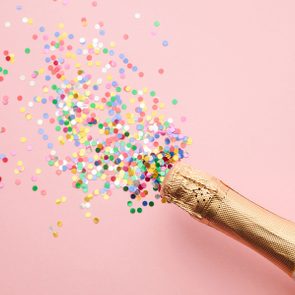 multicolor confetti and champagne