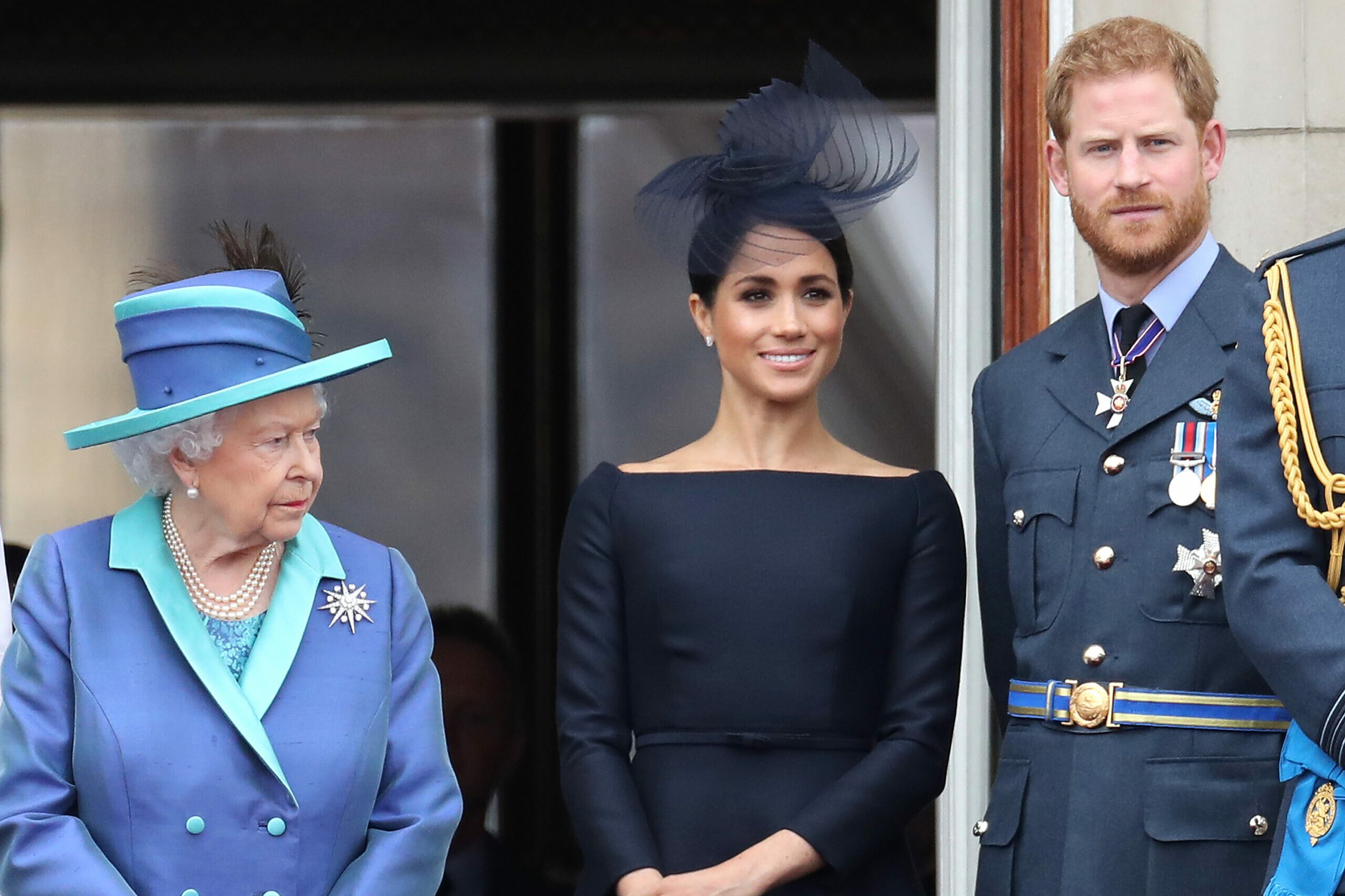 Queen Elizabeth II, Meghan Markle, Duchess of Sussex, and Prince Harry, Duke of Sussex, Attend Events at Buckingham Palace To Mark The Centenary Of The Royal Air Force