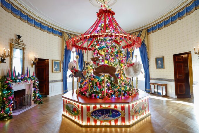 A carousel surrounds a White House Christmas Tree during a media preview of the 2024 holiday decorations at the White House on December 02, 2024 in Washington, DC.