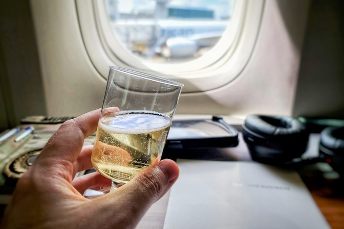 How To Sleep On A Plane, According To Experts And Frequent Travelers