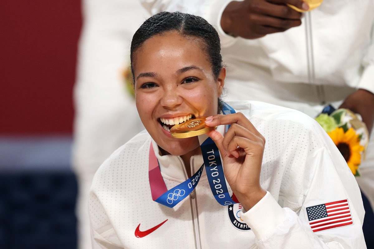 Napheesa Collier Bites Her Gold Medal