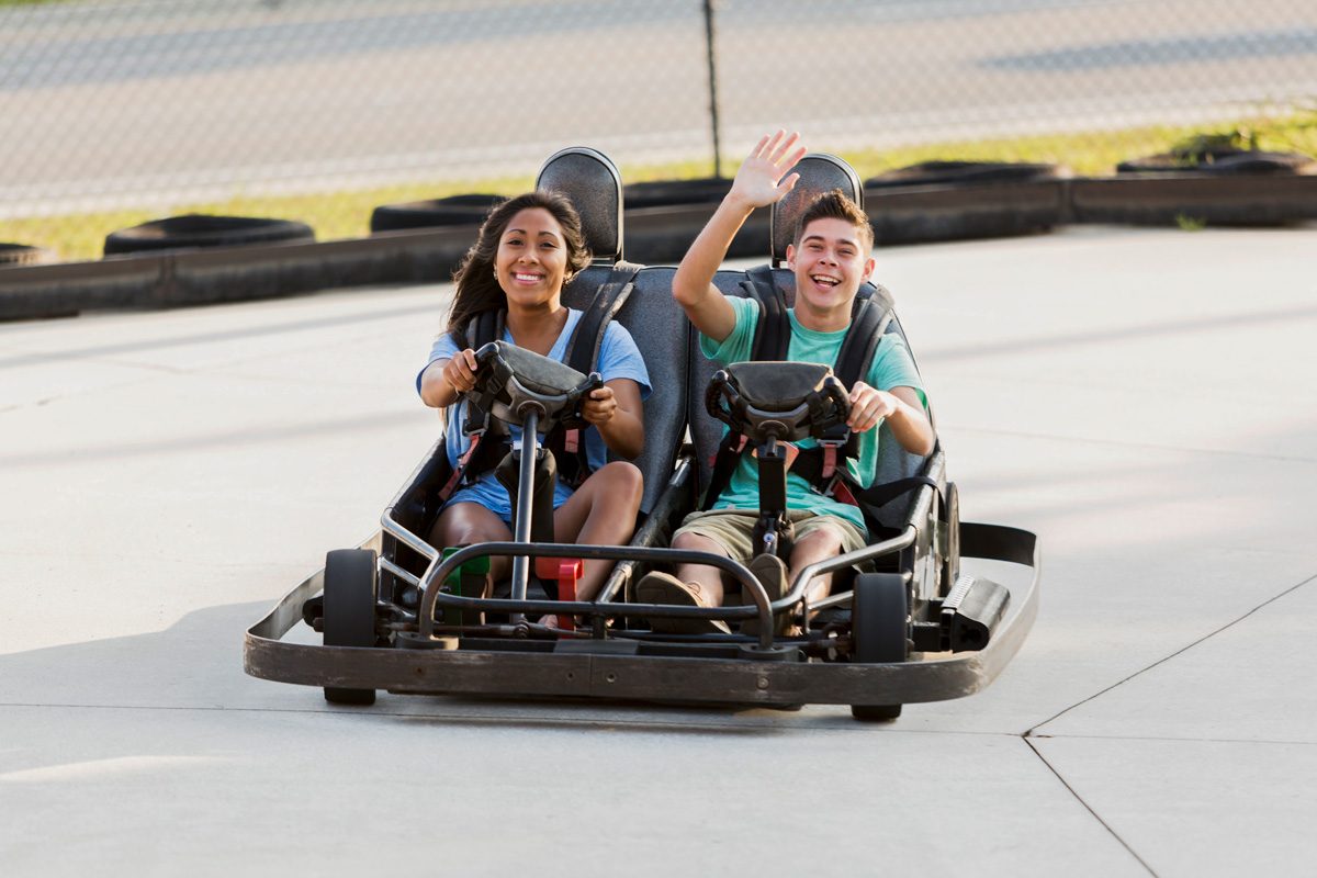 110 Romantic And Fun Date Ideas To Spark A Connection - couple go-karting