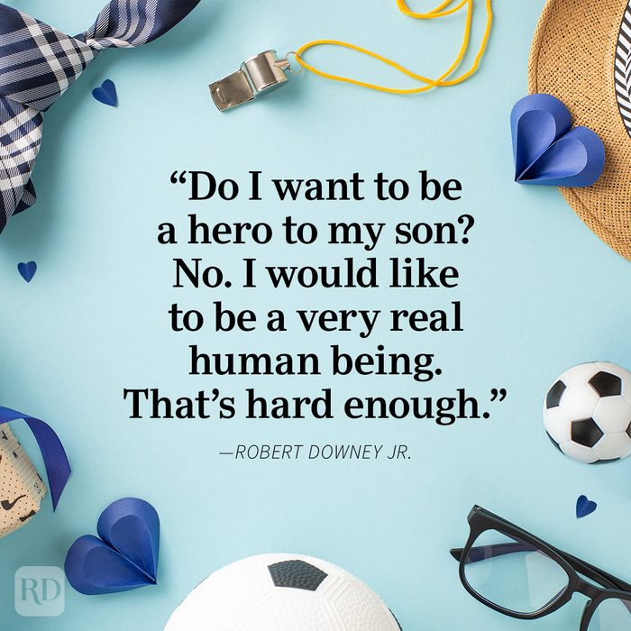 Father's Day quotes on a pastel blue background with a frame of glasses, paper hearts, ties, whistle, footballs.